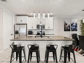14672 Edgewater Cir in Naples, FL - Building Photo - Building Photo