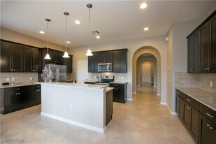 1466 Artesia Dr W in Naples, FL - Building Photo