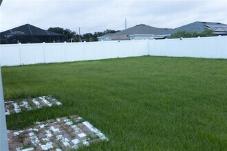 213 Talladega Ln in Polk City, FL - Building Photo - Building Photo