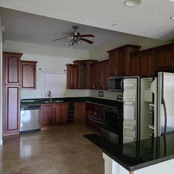 1610 Presidential Way, Unit 105 in West Palm Beach, FL - Building Photo - Building Photo