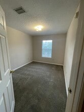 5260 Collins Rd, Unit 402 in Jacksonville, FL - Foto de edificio - Building Photo