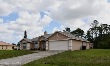995 Black Coral Ave NW in Palm Bay, FL - Building Photo - Building Photo