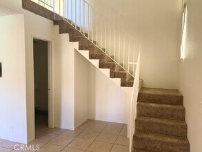 51080 Eisenhower Dr, Unit 409 in La Quinta, CA - Building Photo - Building Photo