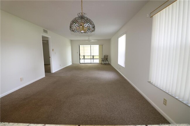 property at 241 SW South River Dr