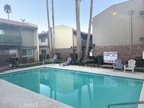 51080 Eisenhower Dr in La Quinta, CA - Building Photo - Building Photo