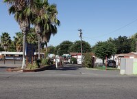 Building Photo - Sunrise Village Apartments in Modesto, California