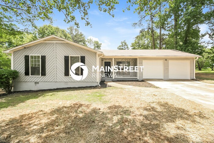 6974 Babbling Brook Dr in Rex, GA - Building Photo