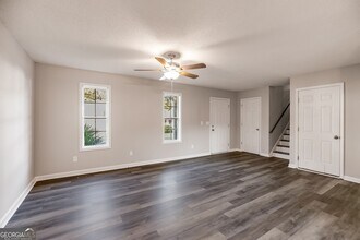 380 River Trace Dr, Unit Adults and children in Villa Rica, GA - Building Photo - Building Photo