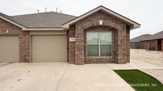 2108 N Avenue L, Unit 5-401 in Lubbock, TX - Building Photo