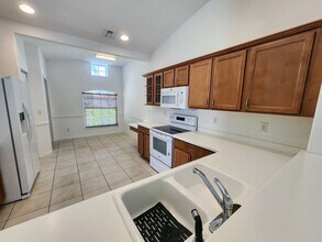 15121 Cortona Way in Naples, FL - Building Photo - Building Photo