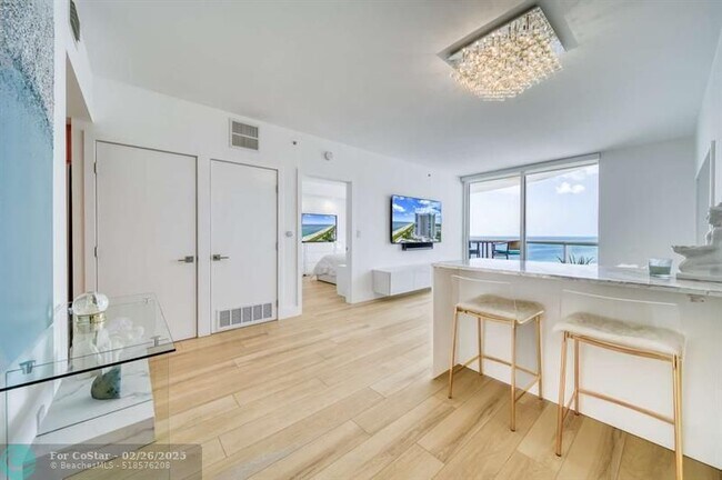 property at 6365 Collins Ave