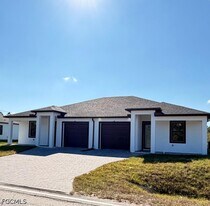 209-211 W 12th St in Lehigh Acres, FL - Building Photo