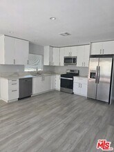 6837 Lubao Ave in Los Angeles, CA - Building Photo - Building Photo