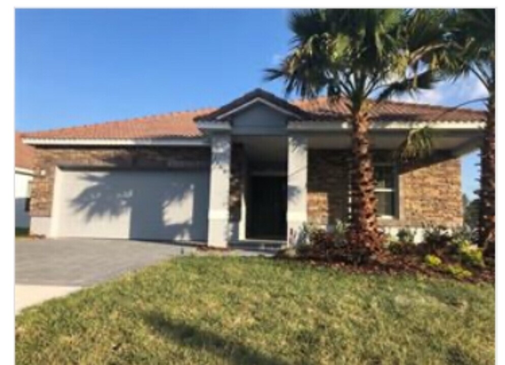 1408 Oak Marsh St in Davenport, FL - Building Photo