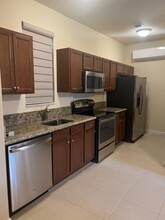 16940 SW 92nd Street Cir, Unit Studio above garage in Miami, FL - Building Photo - Building Photo