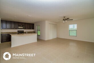 1980 Piedmont Ct in Mascotte, FL - Building Photo - Building Photo