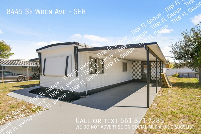 property at 8445 SE Wren Ave