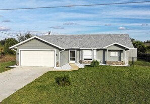 9492 Galaxie Cir in Port Charlotte, FL - Building Photo