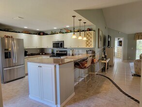 8371 Grand Palm Dr, Unit 3 in Estero, FL - Foto de edificio - Building Photo