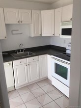 1400 SW 27th Ave-Unit -403 in Miami, FL - Building Photo - Building Photo