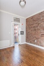 East 1st Street, Unit 4F in New York, NY - Building Photo - Building Photo