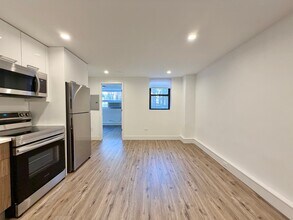 940 W Carmen Ave, Unit 1 in Chicago, IL - Building Photo - Building Photo