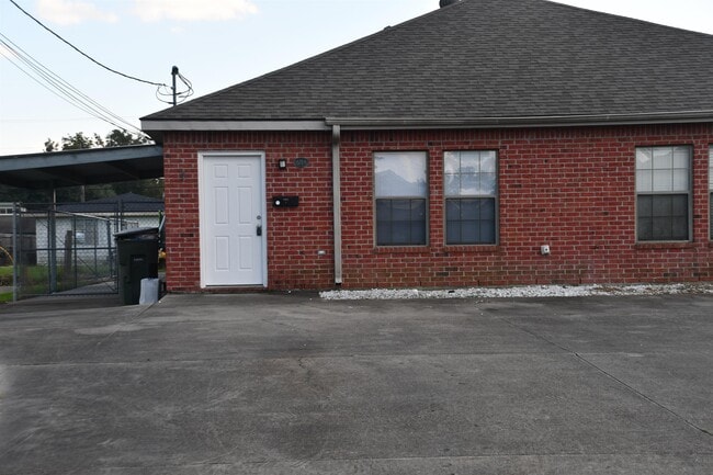 property at 604 Derouen St