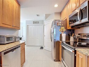 11971 Champions Green Way in Ft. Myers, FL - Foto de edificio - Building Photo