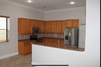 1342 Crossbill Court in Weston, FL - Building Photo - Building Photo