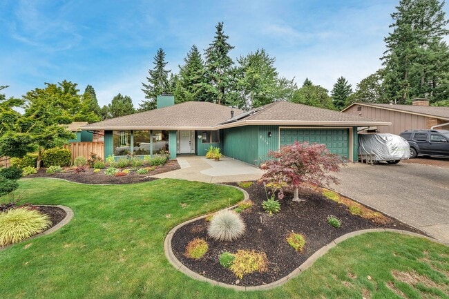 property at 2115 SE Singing Woods Dr