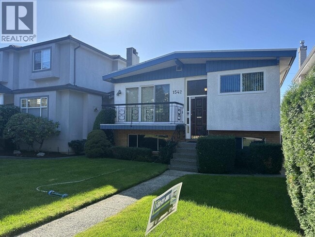 property at 1542 W 65th Ave