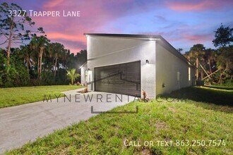 3327 Trapper Ln in North Port, FL - Foto de edificio - Building Photo