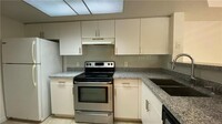 5045 Wiles Rd, Unit 205 in Coconut Creek, FL - Building Photo - Building Photo