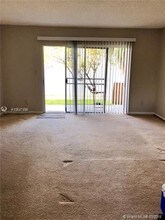 3413 NW 44th St-Unit -105 in Lauderdale Lakes, FL - Building Photo - Building Photo
