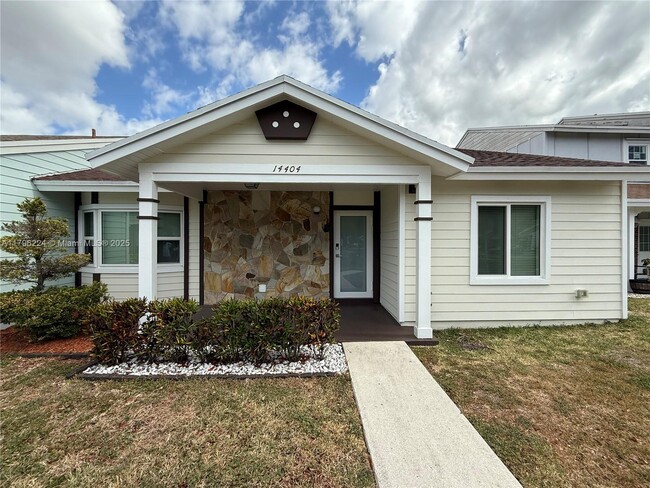 property at 14404 SW 142nd Ct