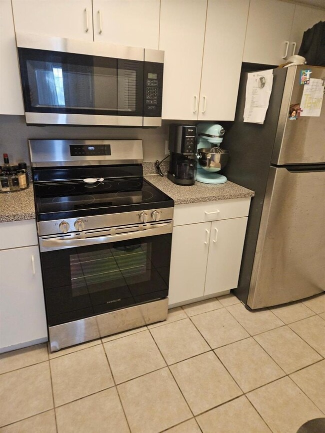 5001 Wiles Rd in Coconut Creek, FL - Building Photo - Building Photo