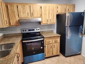 6061 Shaker Wood Cir in Tamarac, FL - Building Photo - Building Photo