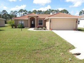 12 Point of Woods Dr in Palm Coast, FL - Building Photo