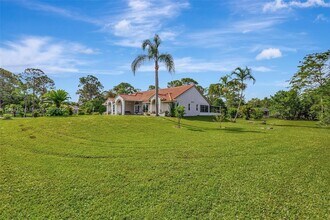 17084 33rd Rd N in The Acreage, FL - Building Photo - Building Photo