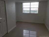 1800 Sans Souci Blvd, Unit 243 in North Miami, FL - Building Photo - Building Photo