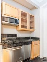 Perry Street in New York, NY - Building Photo - Building Photo