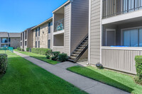 Carriage House Apartments in Nederland, TX - Building Photo - Building Photo