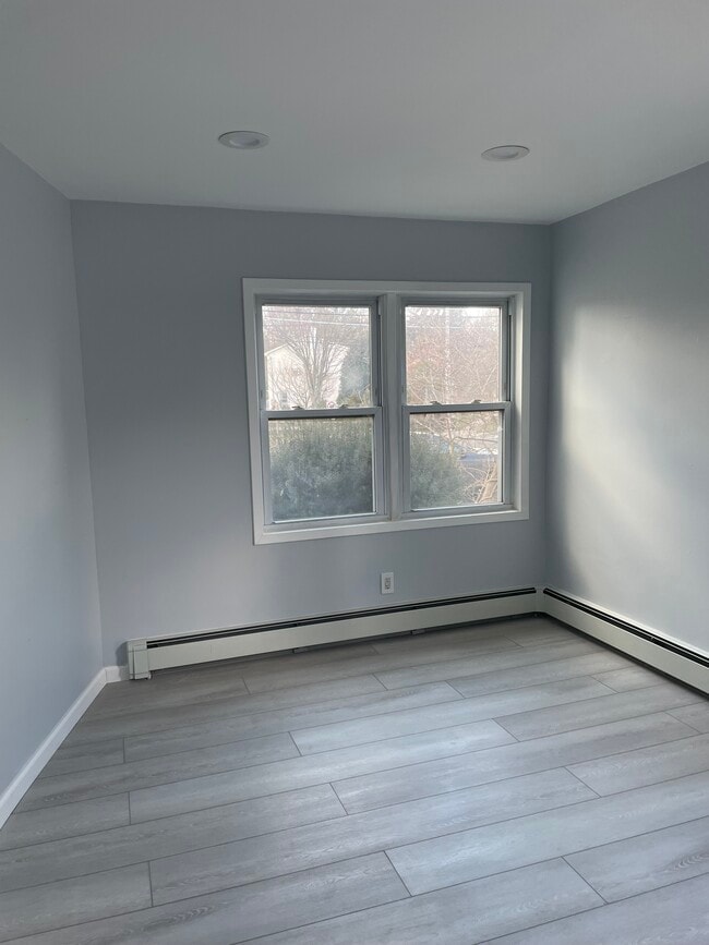 111 Main St in Farmingdale, NY - Foto de edificio - Building Photo