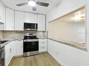 7665 Sun Island Dr S in South Pasadena, FL - Building Photo - Building Photo