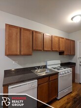 630 W Cornelia Ave, Unit 1 in Chicago, IL - Building Photo - Building Photo