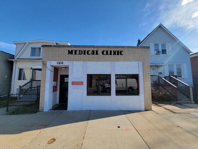 property at 6151 W Belmont Ave