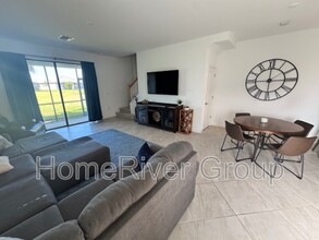 14124 Pine Lodge Ln in Miromar Lakes, FL - Building Photo - Building Photo