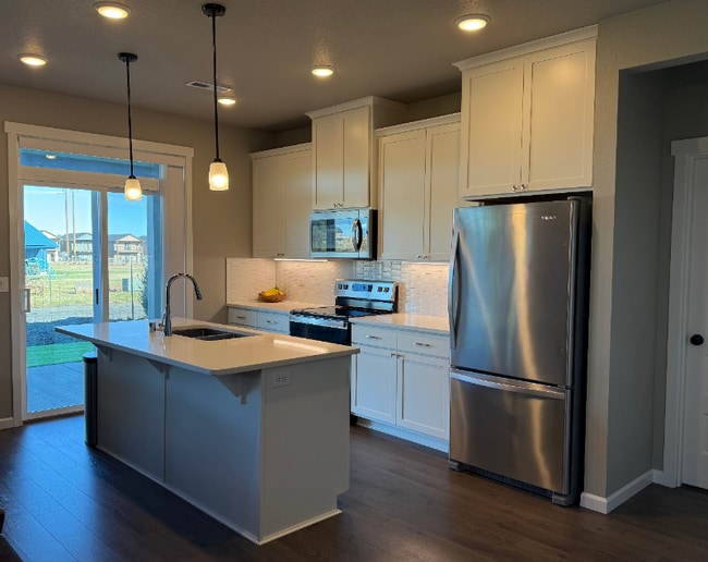 9008 W Caelen Ave in Cheney, WA - Building Photo - Building Photo