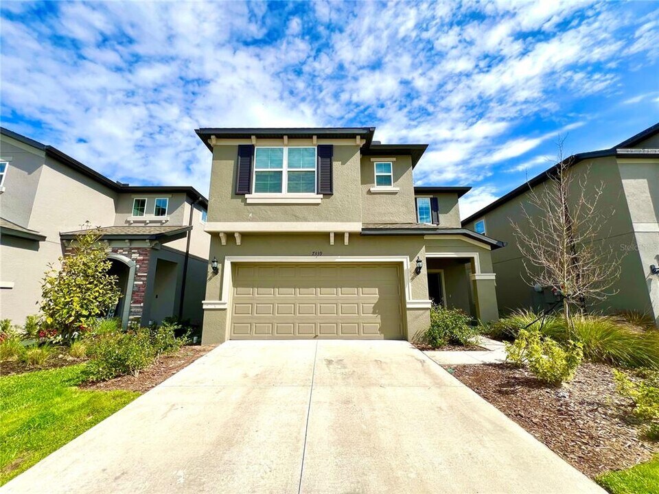 7339 Pool Compass Loop in Wesley Chapel, FL - Building Photo