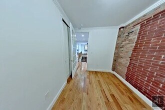 East 100th Street, Unit 1A in New York, NY - Building Photo - Building Photo